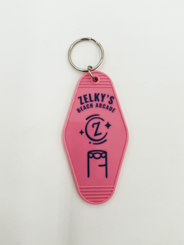 pink arcade hotel keychain accessory