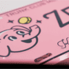 A close up of the trunk club license plate